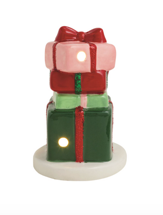 Hand-painted ceramic Present Light-Up Sitter featuring stacked Christmas gift boxes with red, green, and pink wrapping, glitter ribbon accents, and built-in LED lights.