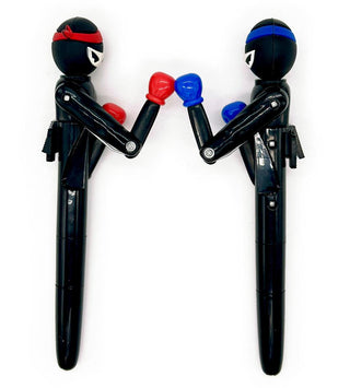 Ninja Knockout Action Pens set with red and blue ninjas

Snifty Ninja Knockout pens boxing action toy set

Fun ninja-themed action pens for kids

Pair of ninja pens with red and blue gloves

Ninja Knockout novelty writing pens in gift packaging
