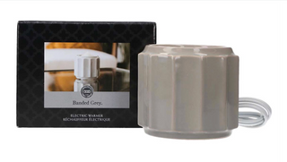 Grey banded electric wax warmer with ceramic finish and power cord for home fragrance

Wax Warmer Grey Banded ceramic electric warmer for wax melts and fragrance oils

Modern grey banded wax warmer with sculpted design and corded electric base