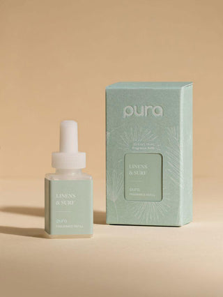 Pura Smart Fragrance Vial in Linens & Surf featuring fresh linen, jasmine, creamy coconut, and sea spray notes.